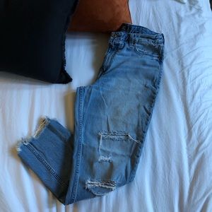 High rise distressed jean